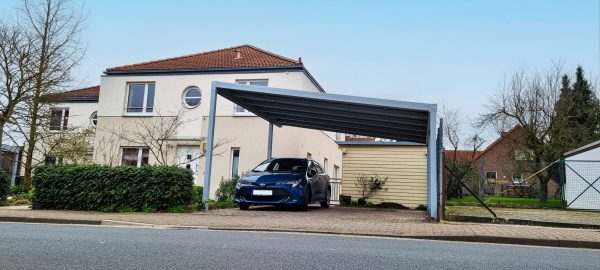 Freestanding carport with cover
