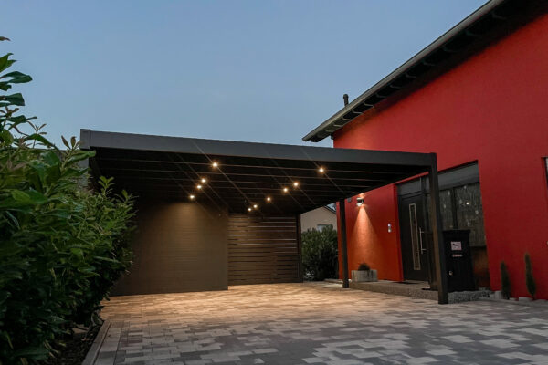 Large black canopy for cars with an additional room