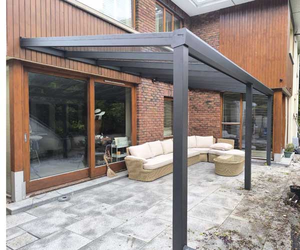 Wall-mounted aluminium canopy with glass roof in Wexford