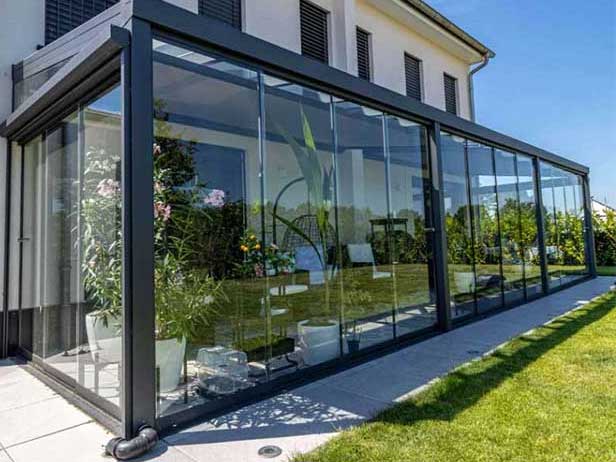 Private garden room retreat with glass walls
