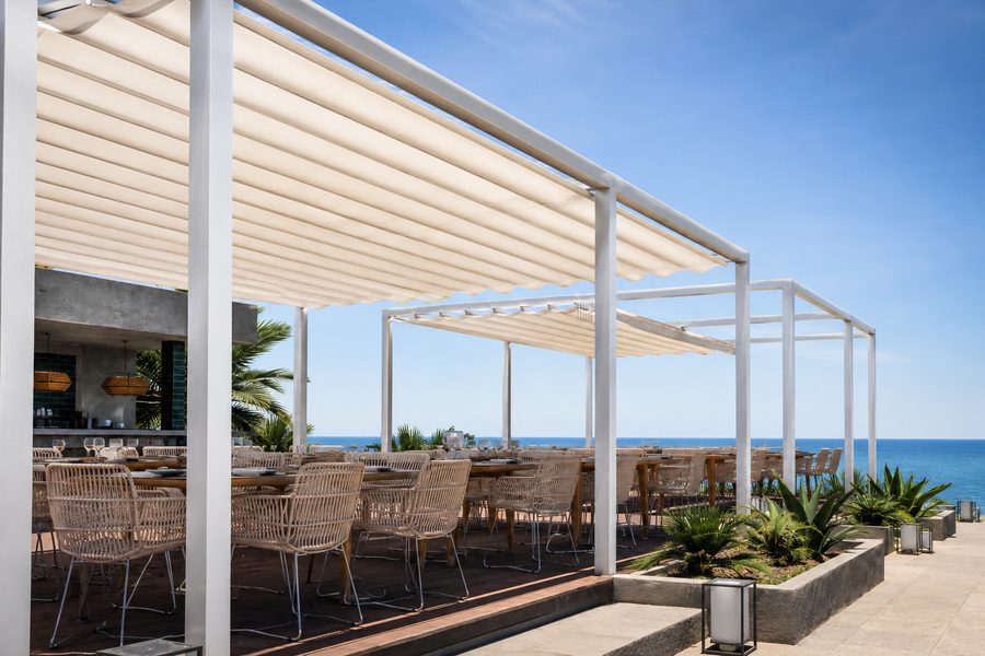 Electric patio awning for outdoor terrace shade