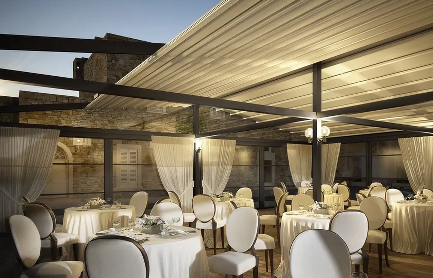ATRIUM retractable fabric-roof pergola for a hospitality terrace