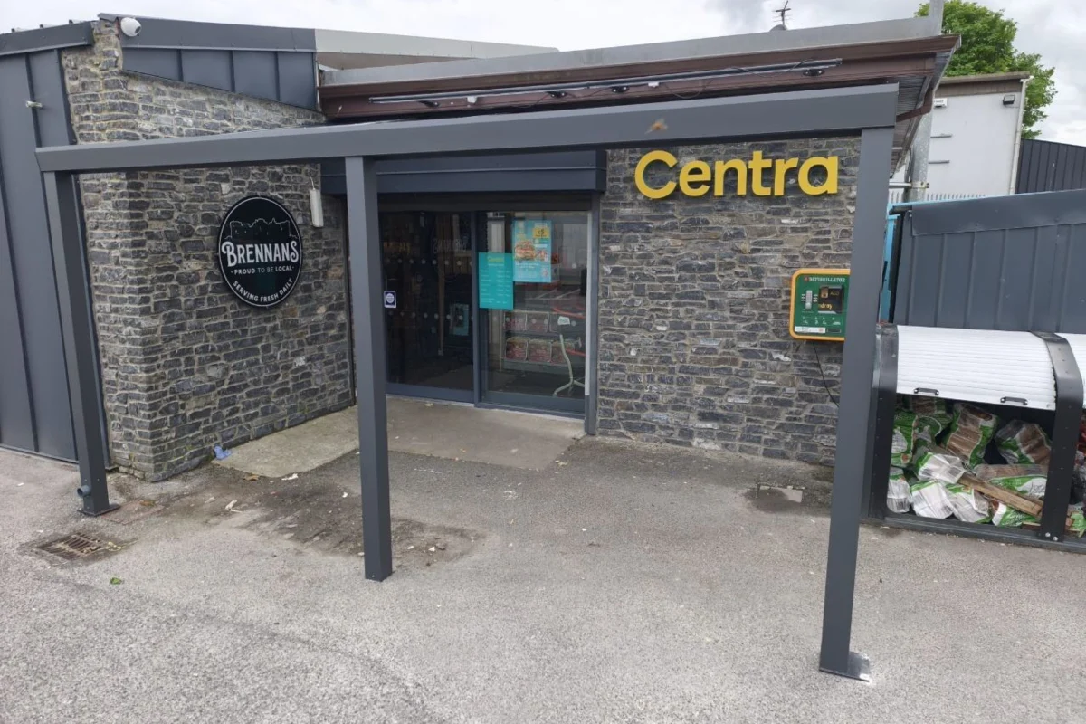 Aluminium entrance canopy at a Centra retail location by AVC Build
