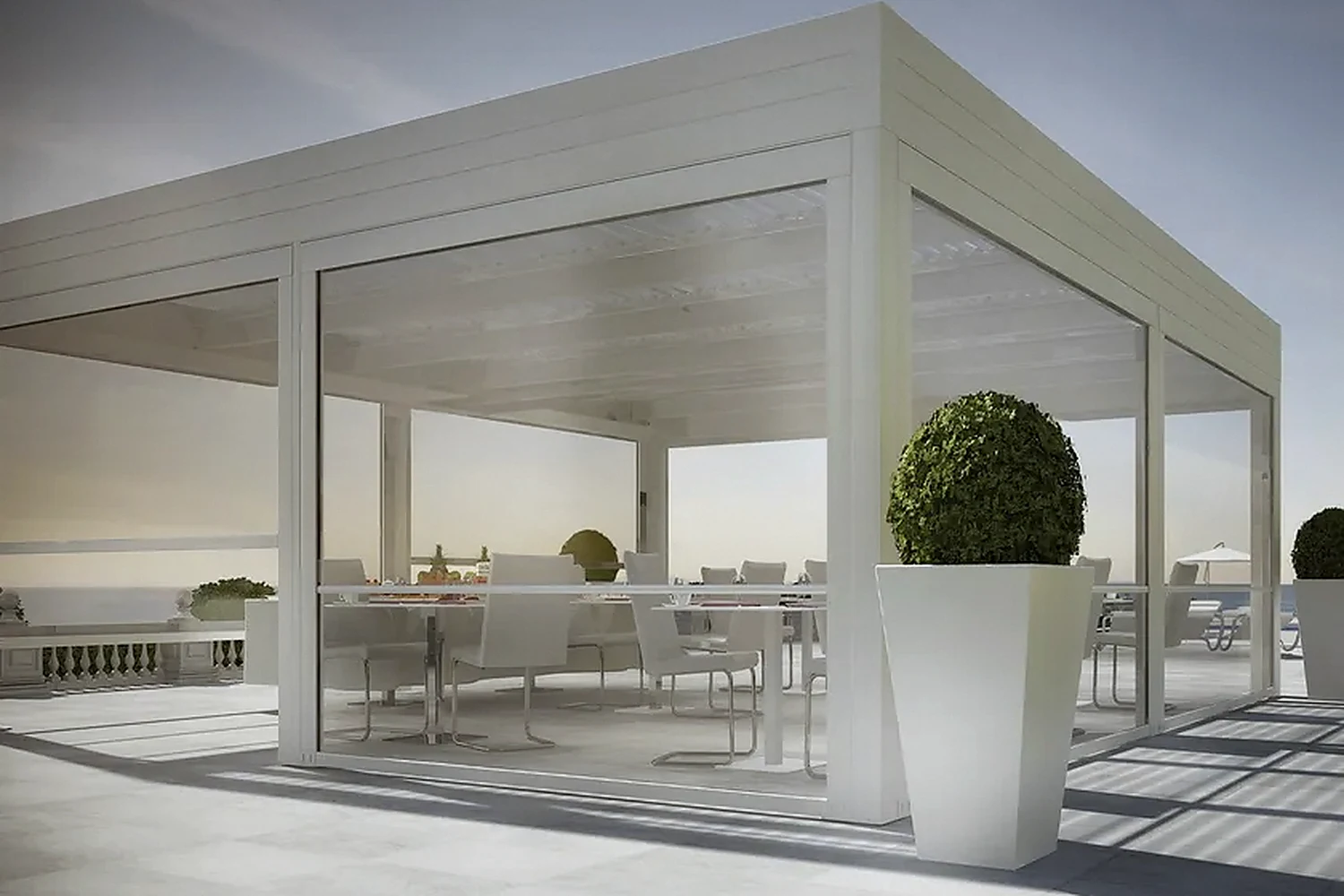 SOLAR ONE vertical drop awning with side guides for a covered terrace