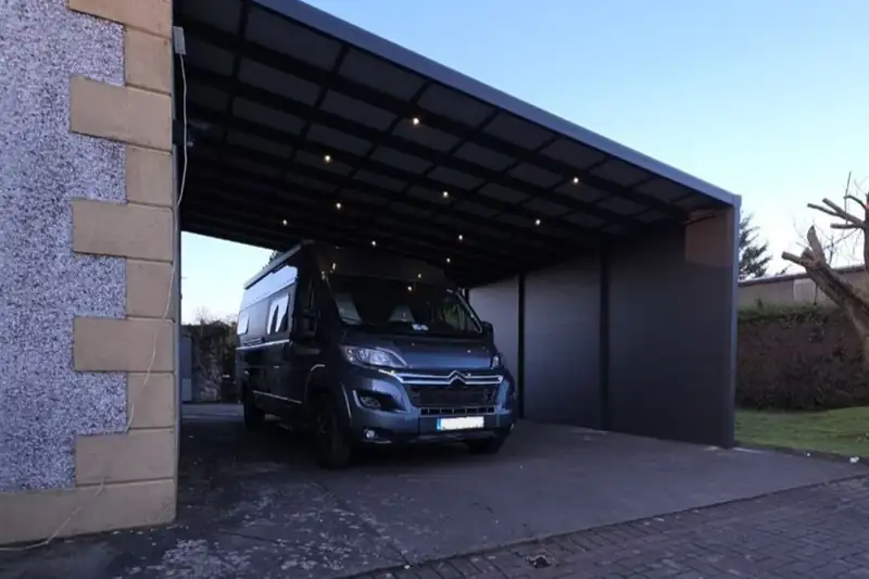 Wall-mounted aluminium carport attached to a private home in Ireland
