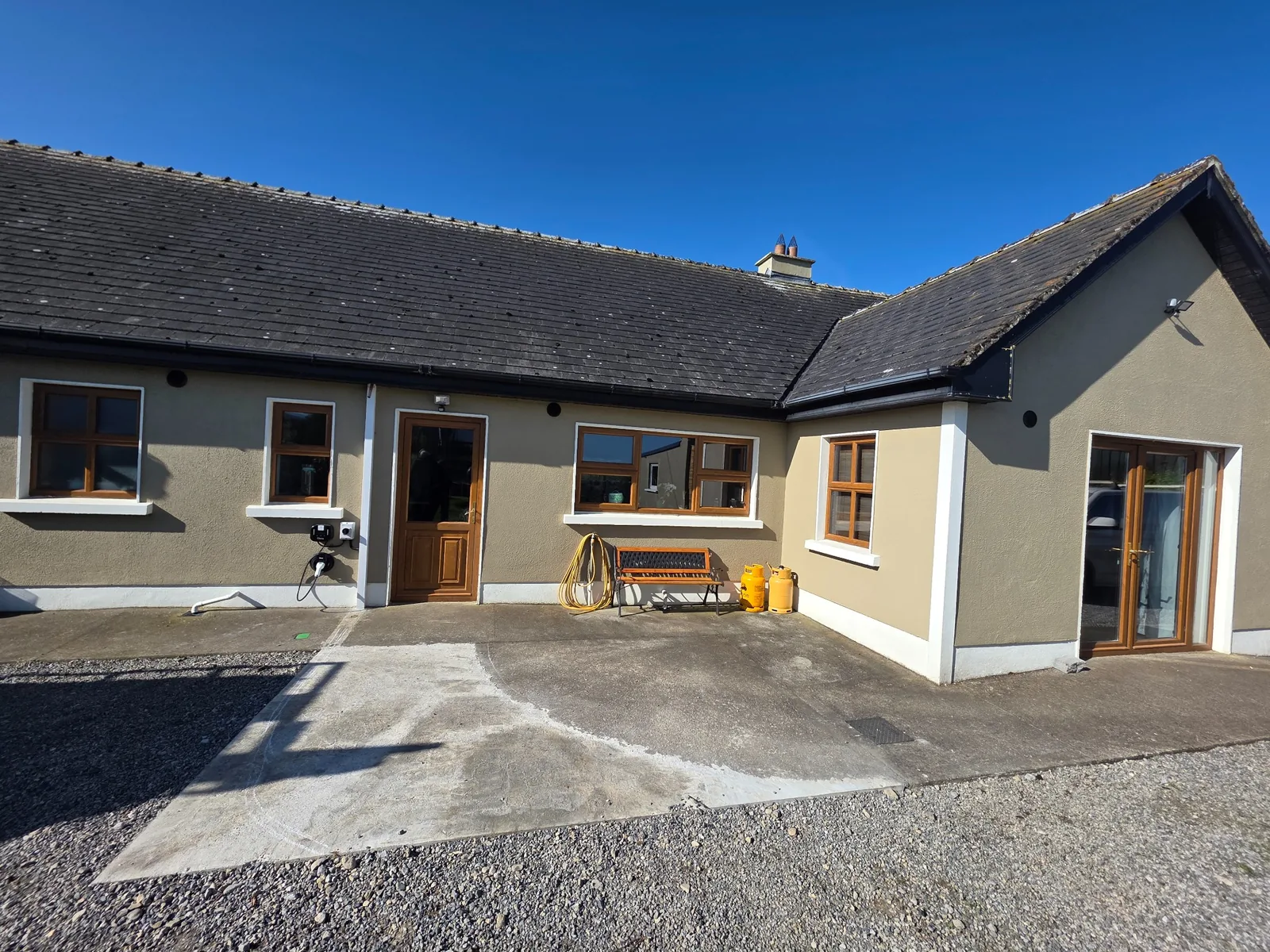 Existing patio area in Roscommon before installation of the aluminium garden room
