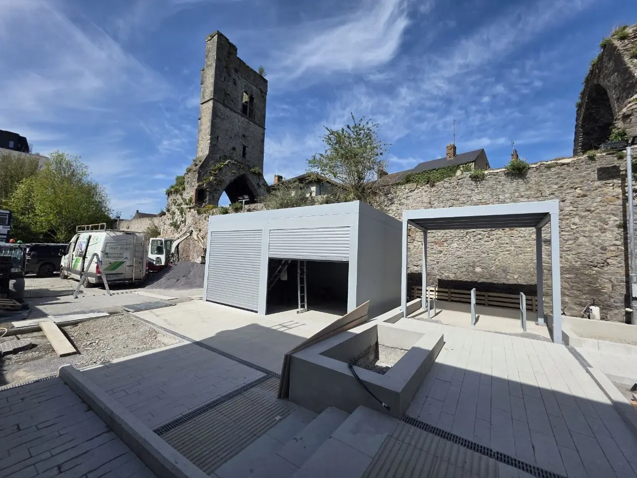 Wide view of the open bicycle shelter and enclosed storage shelter at the Garda station in Drogheda