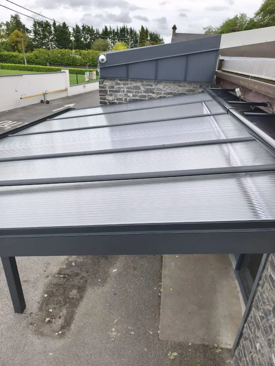 Top view of the clear polycarbonate panels and integrated rainwater gutter