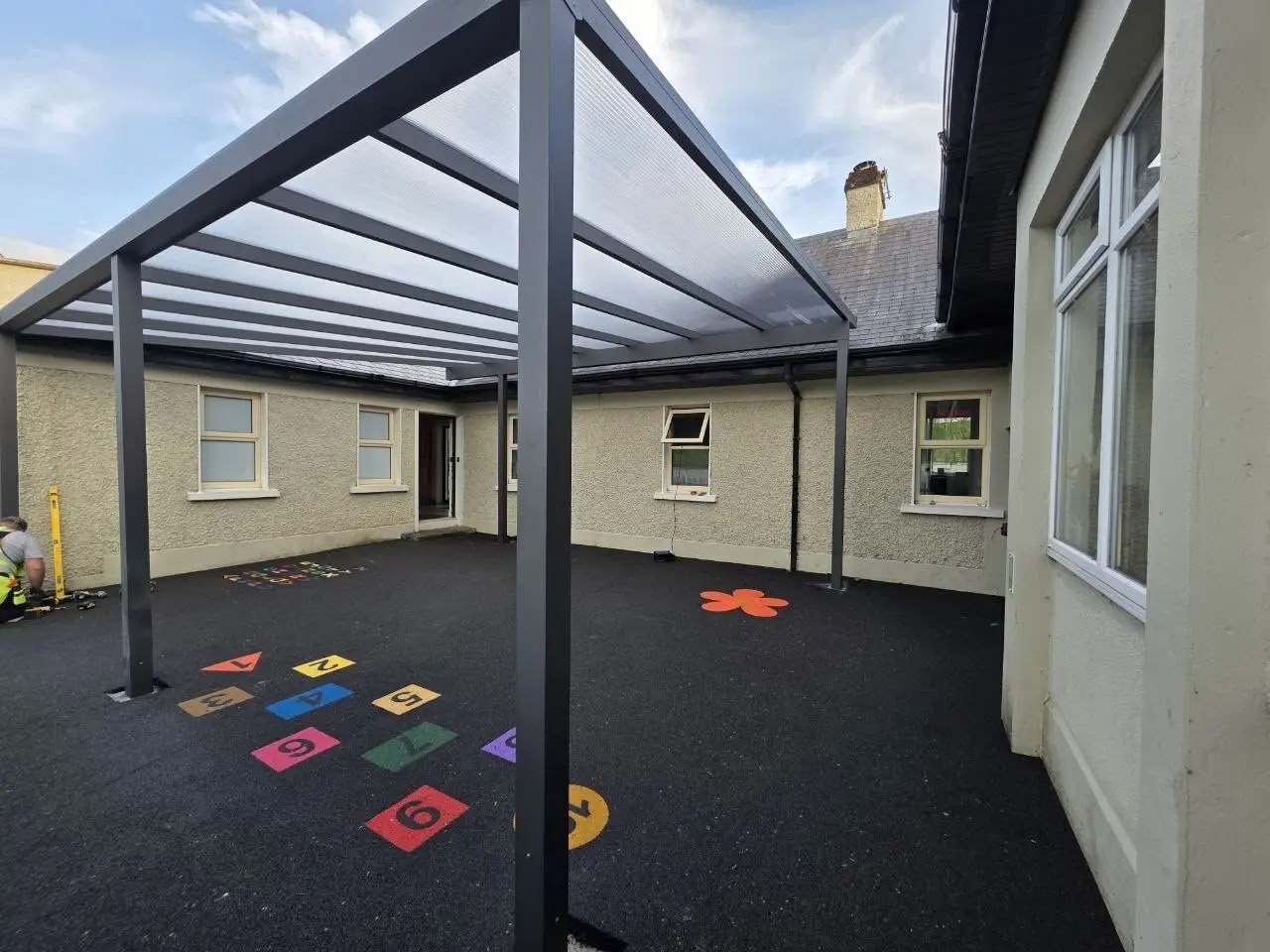 View beneath the completed aluminium canopy in the Meelick Primary School courtyard