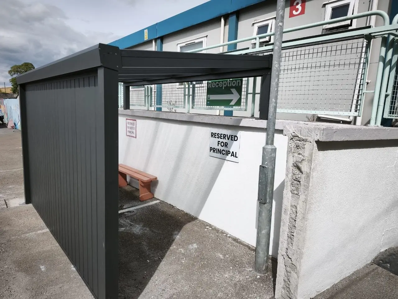 Wide view of the completed aluminium shelter at a school in Cashel