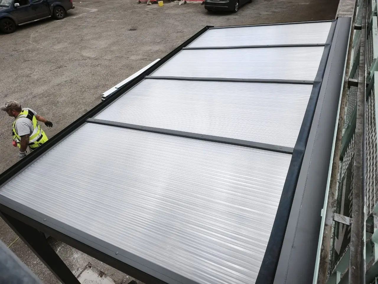 Clear polycarbonate roof panels on the school shelter in Cashel