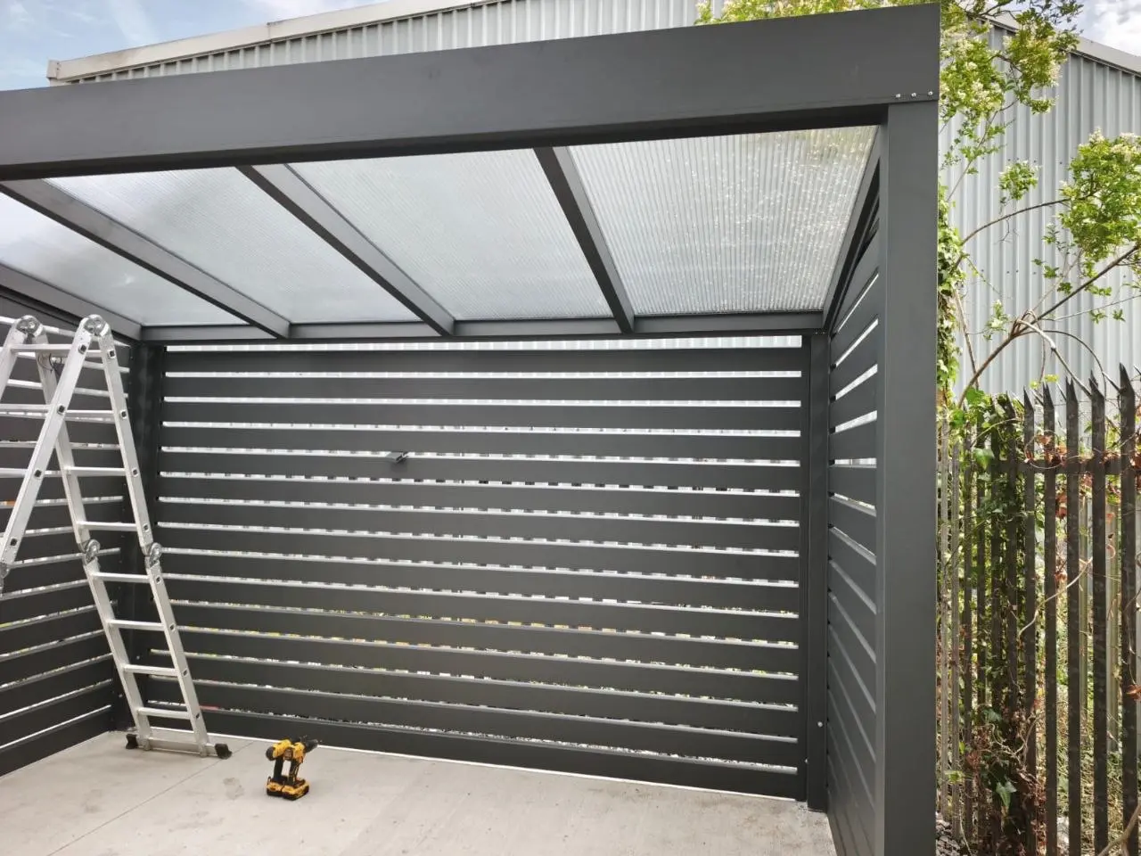 Clear polycarbonate roof and aluminium walls during installation at Würth Limerick