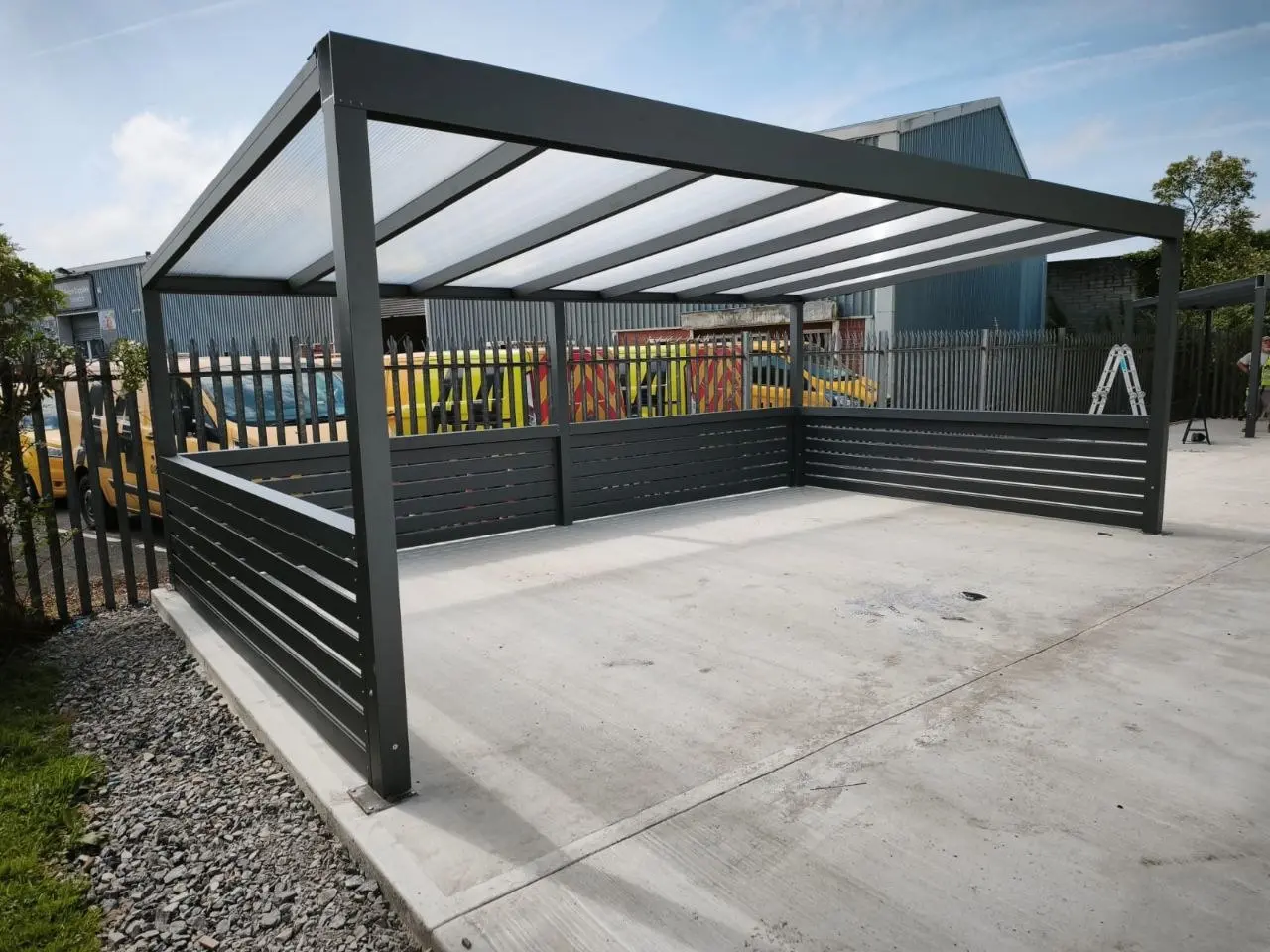 Side angle of the black aluminium commercial shelter in Limerick