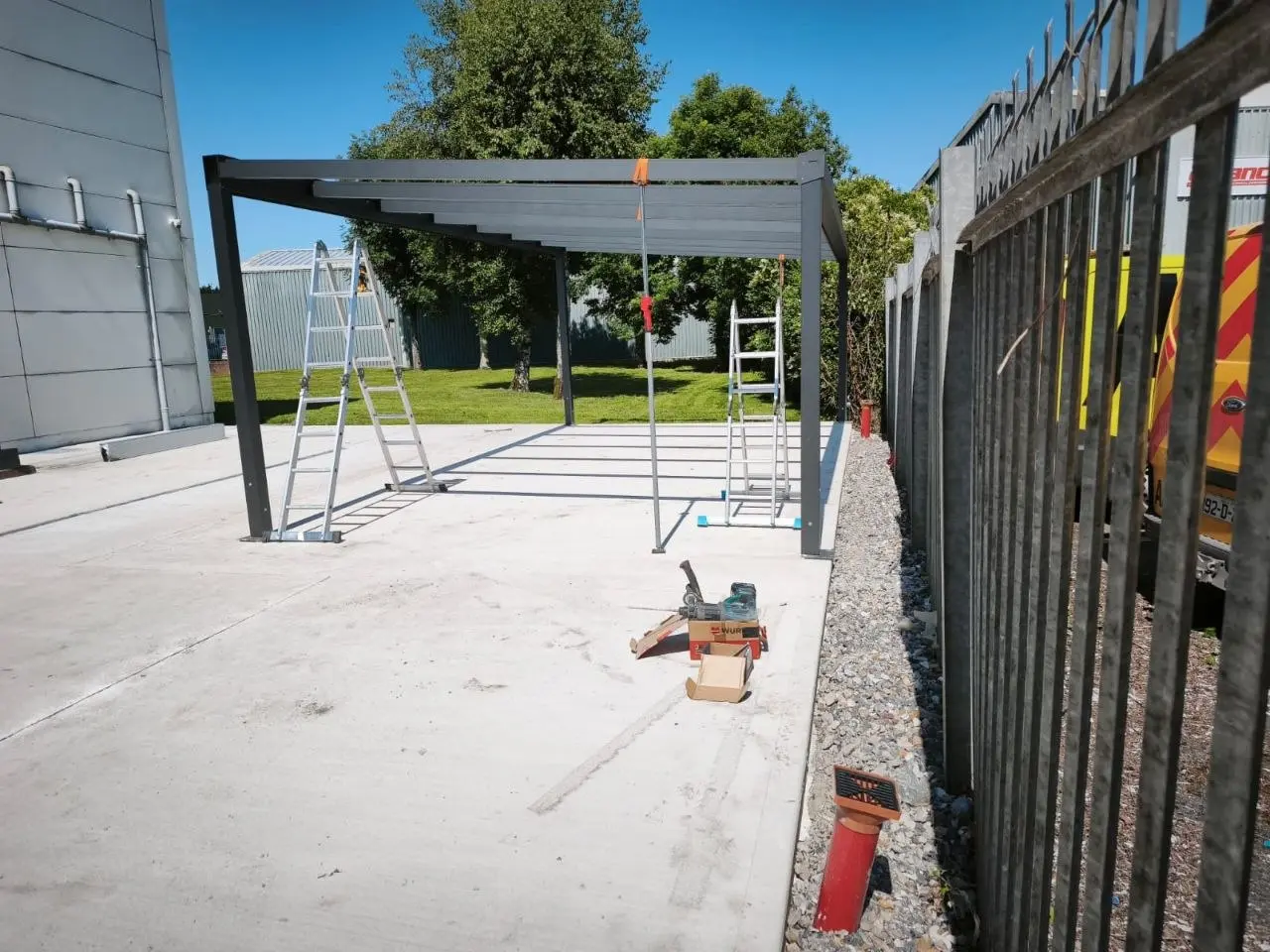 Freestanding aluminium frame during installation at Würth Limerick