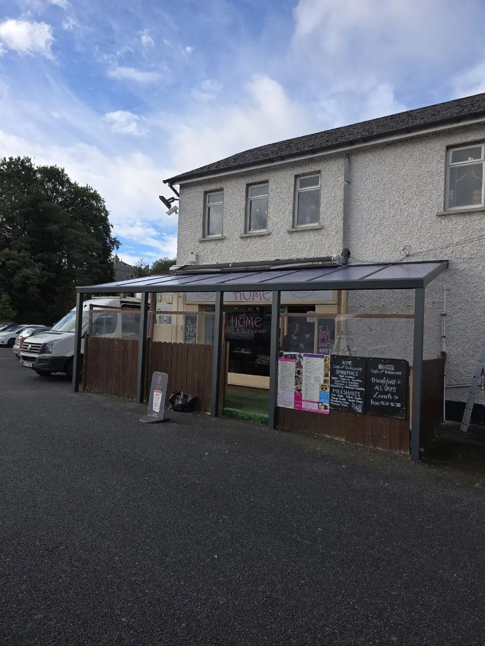 Front view of the completed wall-mounted canopy beside commercial premises in Naas