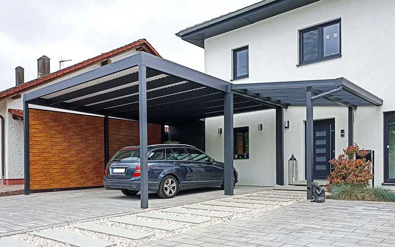 Custom aluminium roof beside a residential property