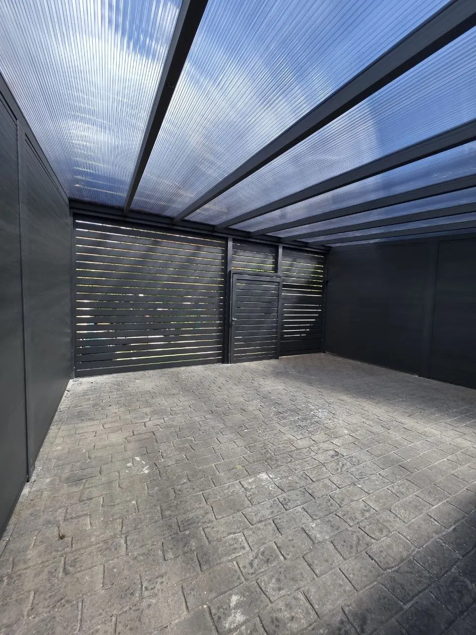 Completed enclosed aluminium carport garage interior in Monkstown, Dublin