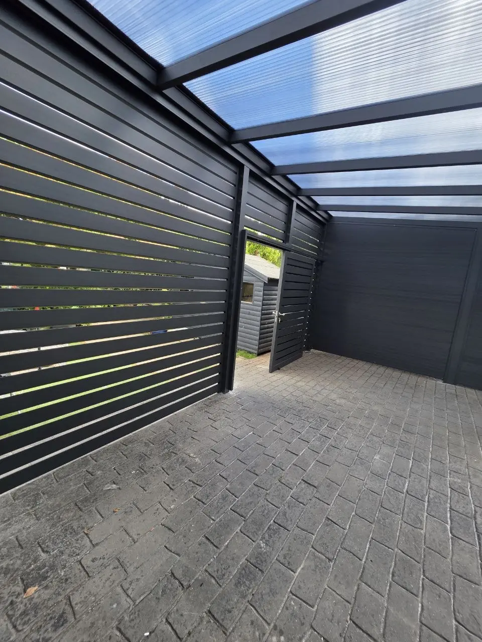 Interior view of the Diamond-shaped aluminium slatted garden-facing wall in Monkstown