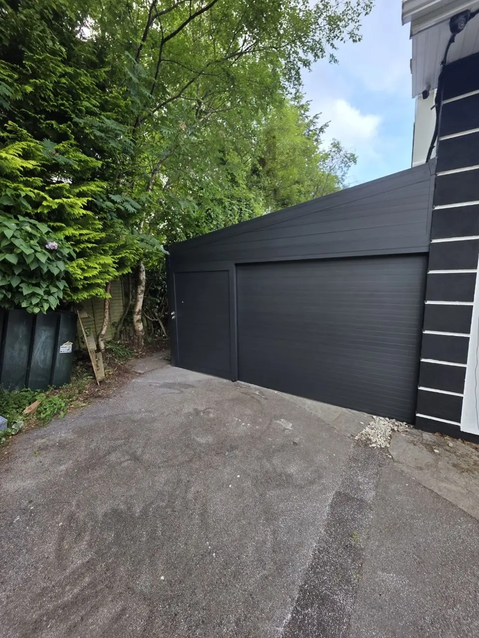 Completed enclosed aluminium carport and storage structure in Kilbride