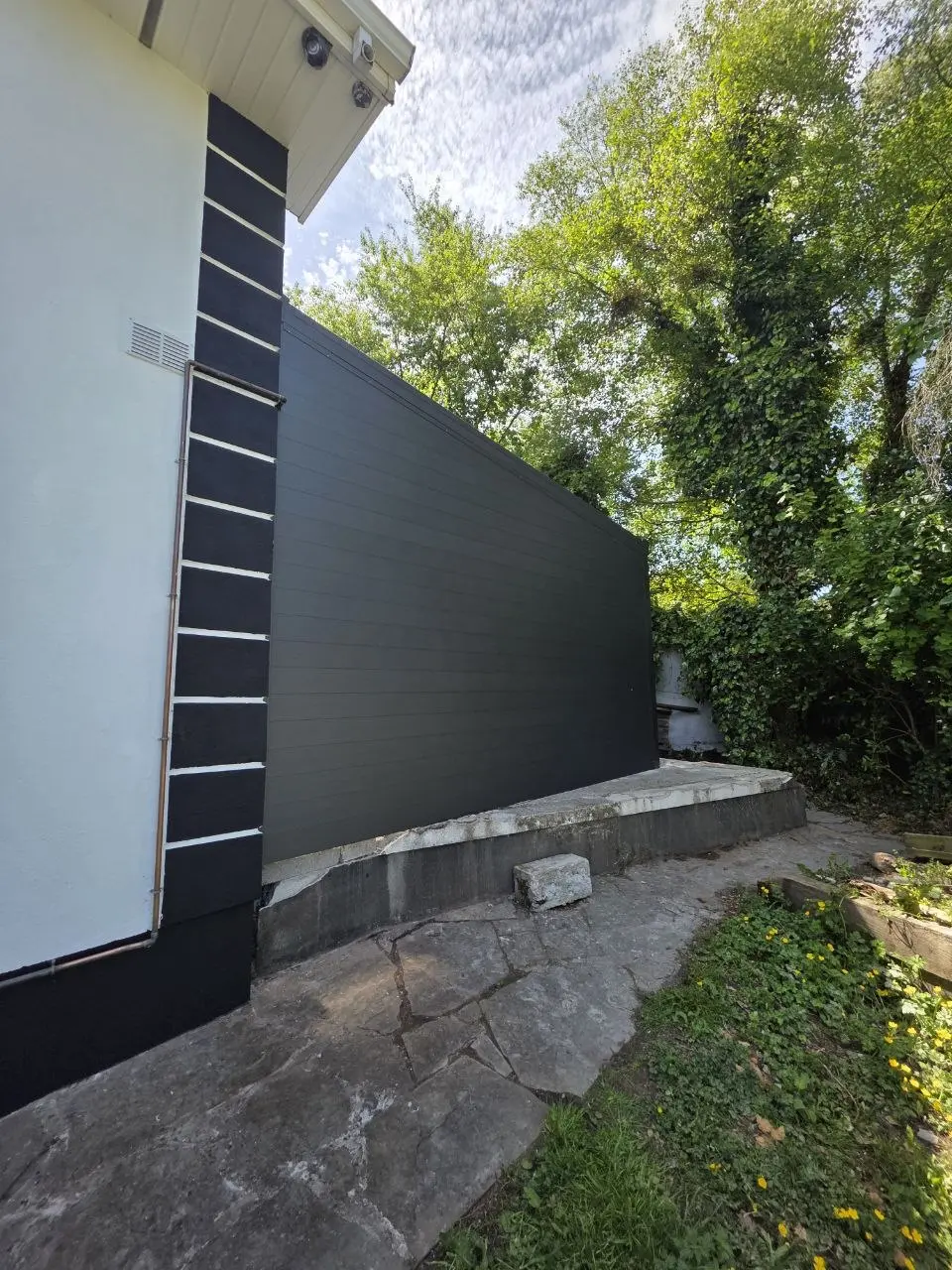 Exterior side view of the enclosed aluminium carport in Kilbride, Co. Wicklow