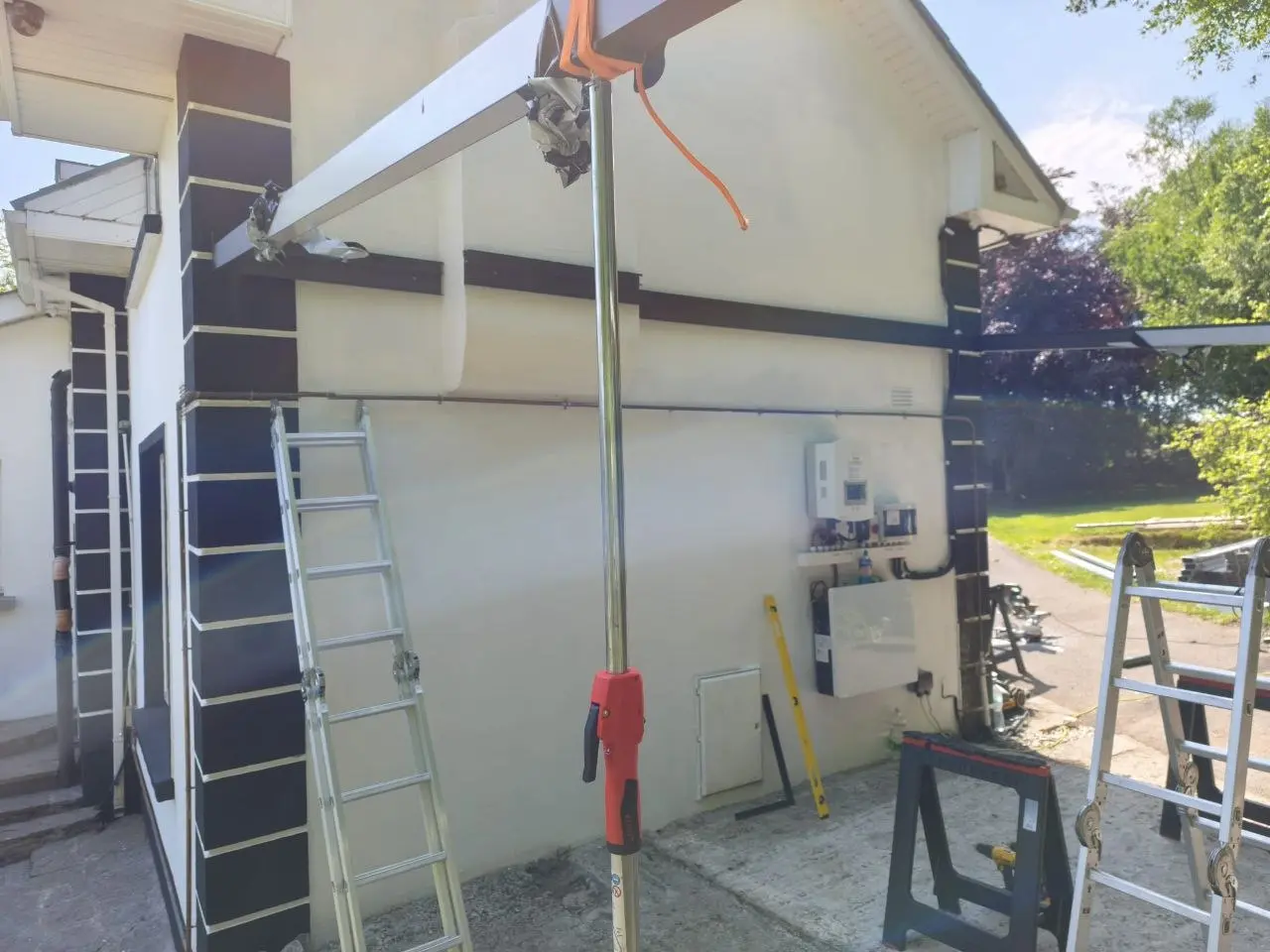 Wide view of the made-to-measure aluminium frame during installation in Kilbride