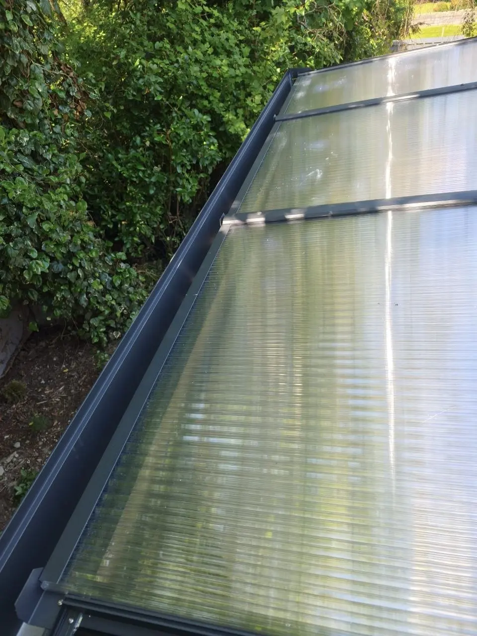 Multiwall polycarbonate roof detail inside the enclosed aluminium carport