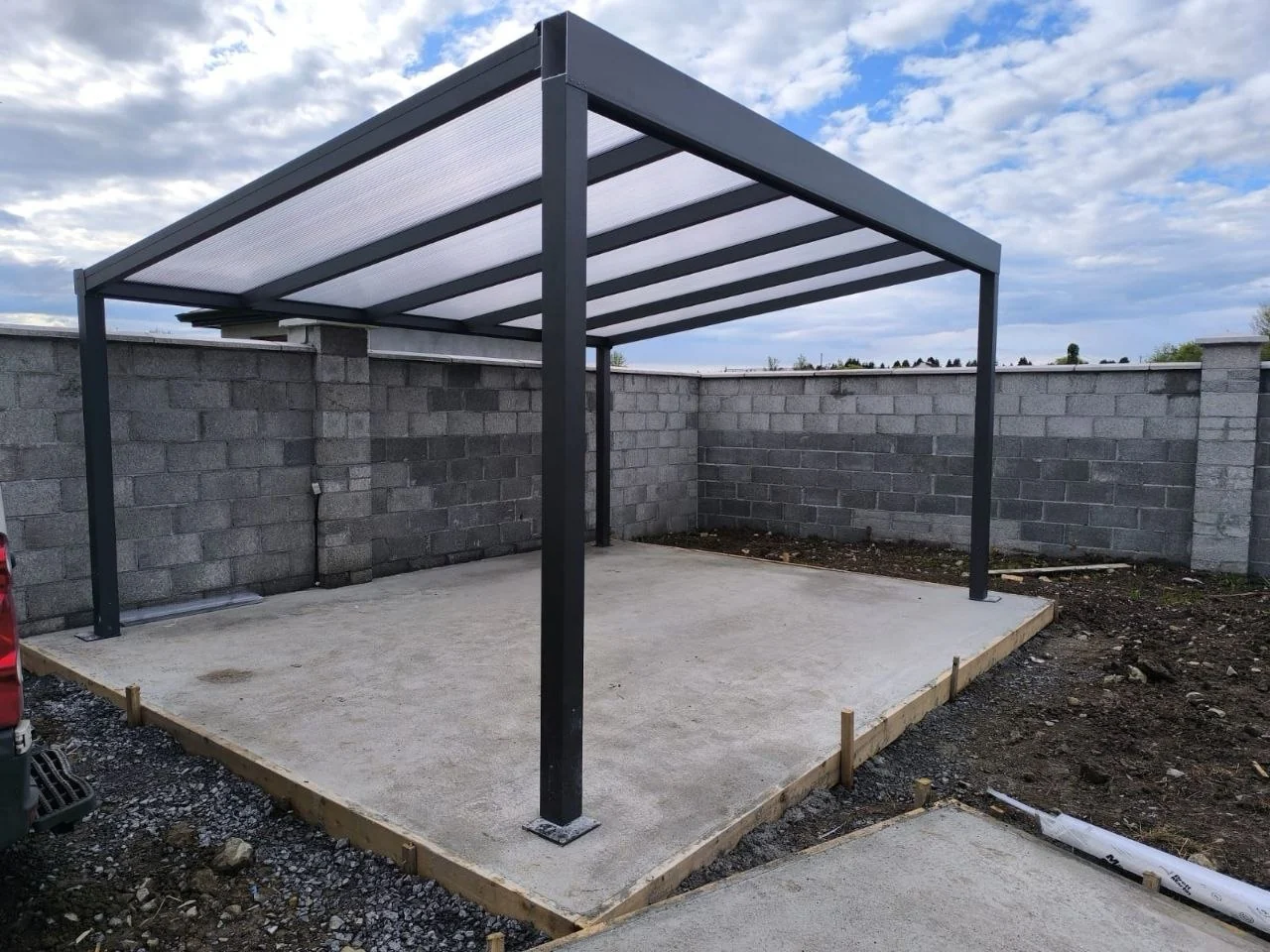 Front view of the completed freestanding polycarbonate pergola in Roscommon