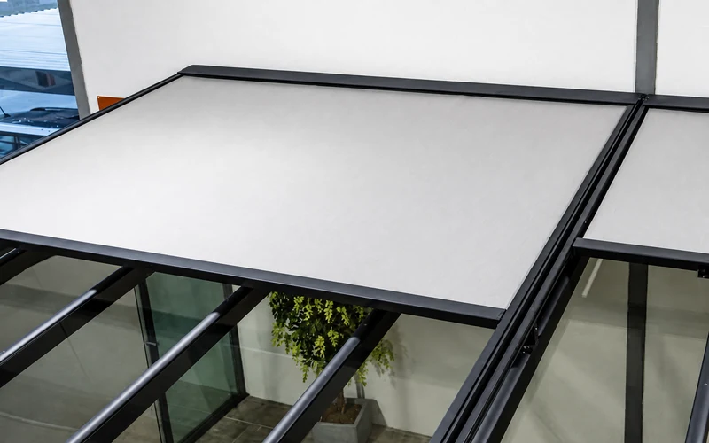Awning system combined with a glazed terrace roof