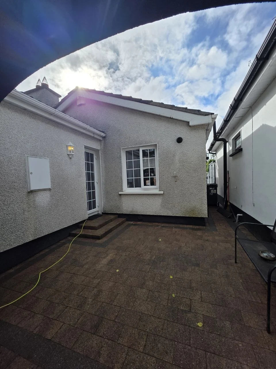 Residential courtyard in Dublin before installation of the aluminium polycarbonate canopy