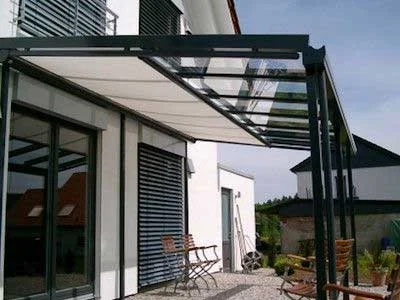 Trend 200 under-roof awning installed below a glass canopy