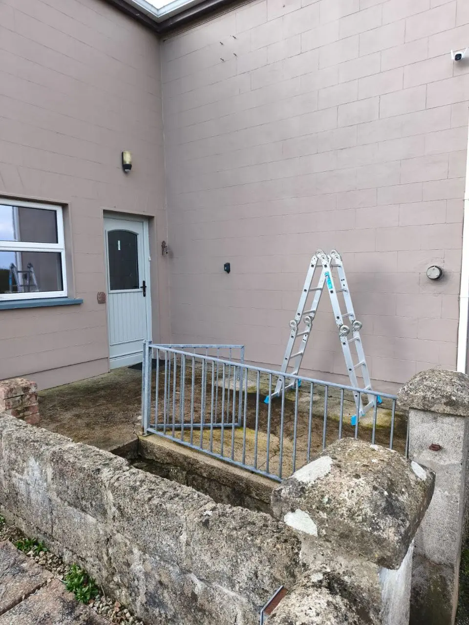 Concrete area beside a Cavan home before canopy installation