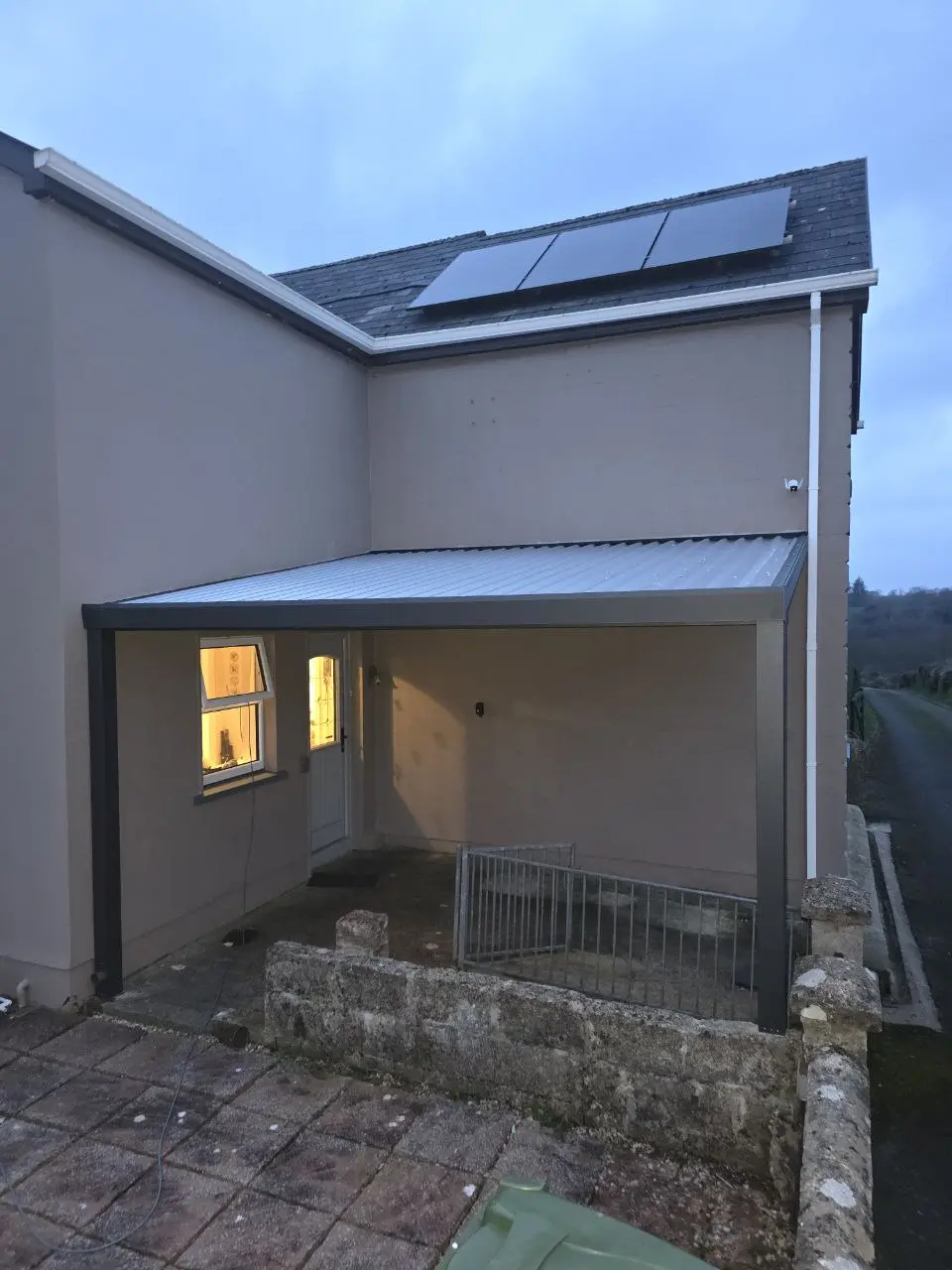 Completed canopy with a trapezoidal metal sheet roof in Cavan