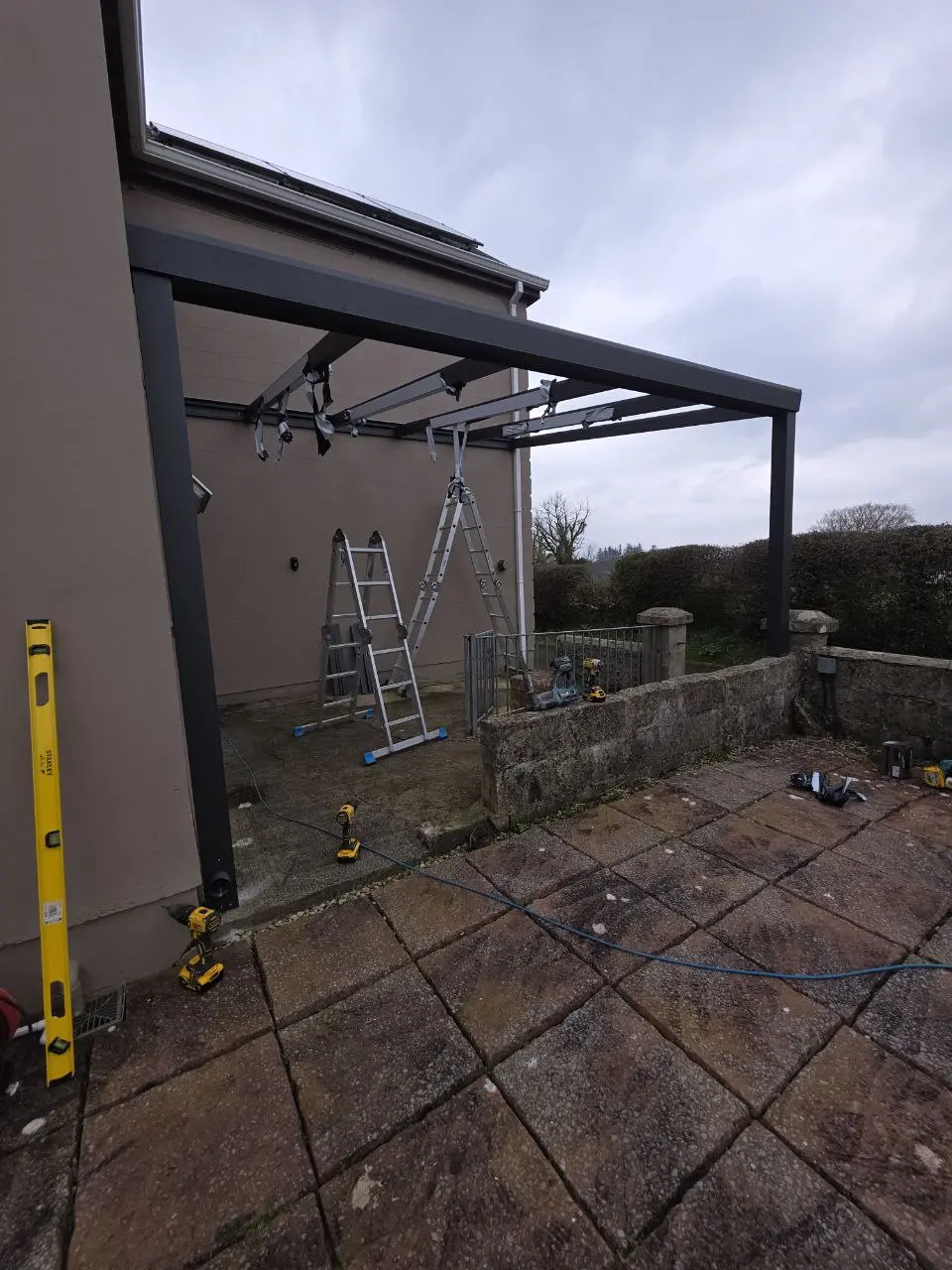 Roof support frame during aluminium canopy installation in Cavan