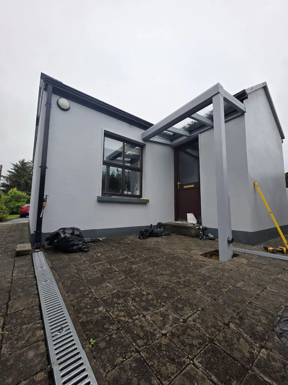 Support post and roof frame during canopy installation in Westport, County Mayo