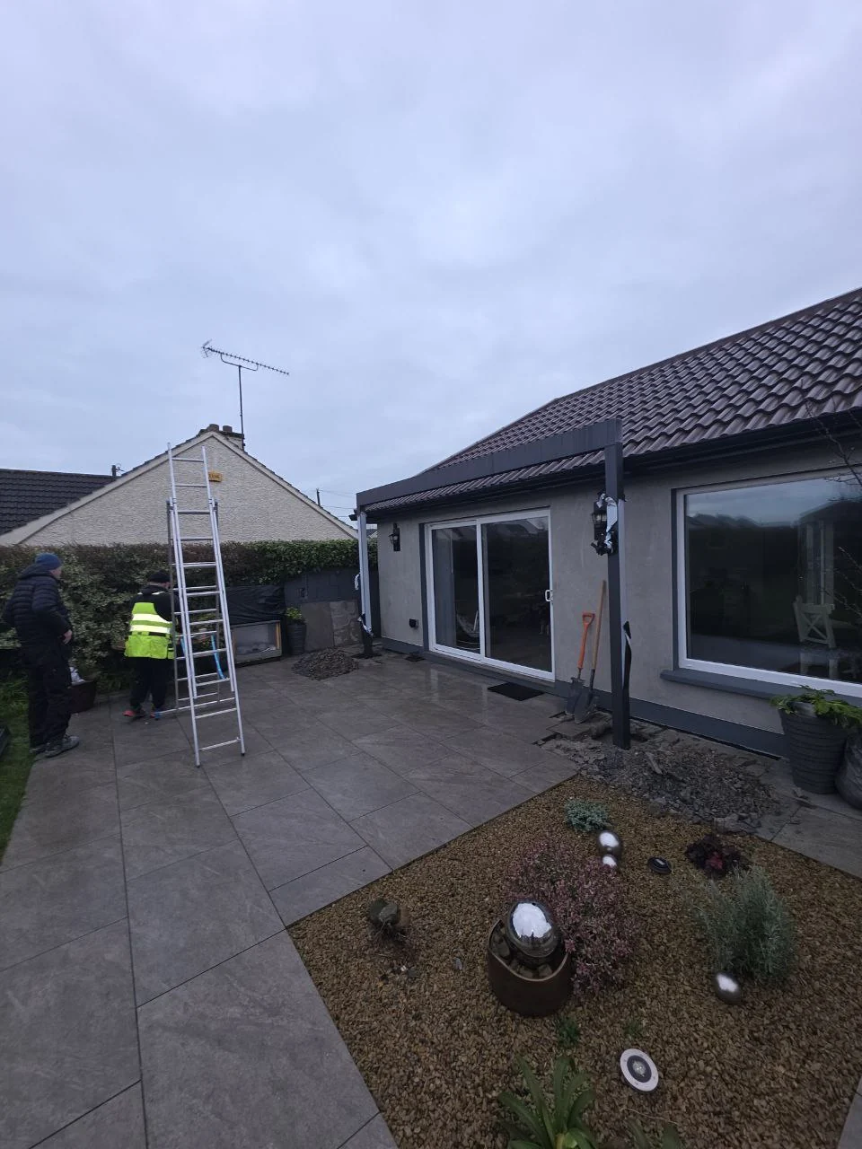 Freestanding aluminium pergola frame during installation at the residential property in Dublin
