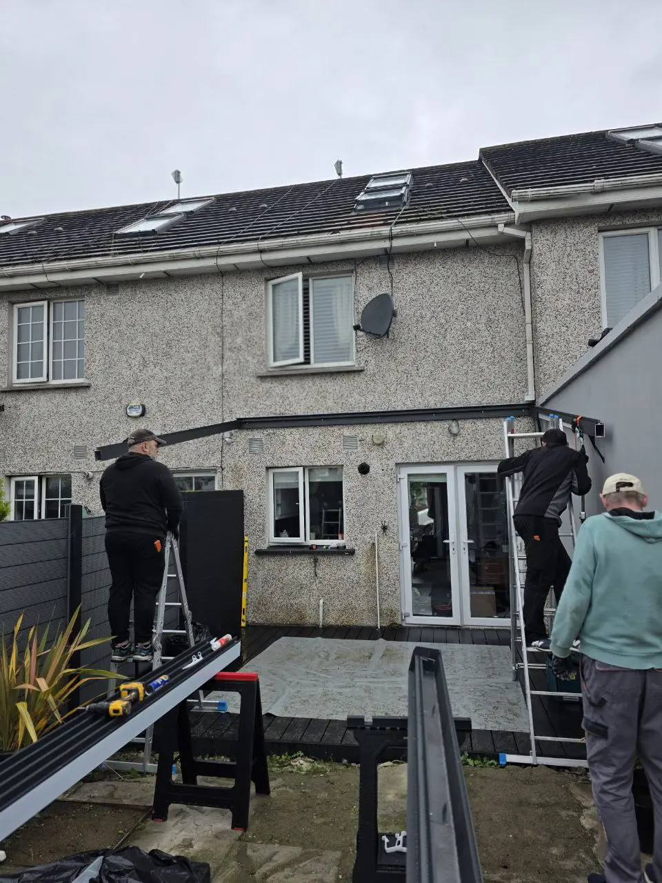 Black aluminium pergola frame during installation at a residential property in Dublin
