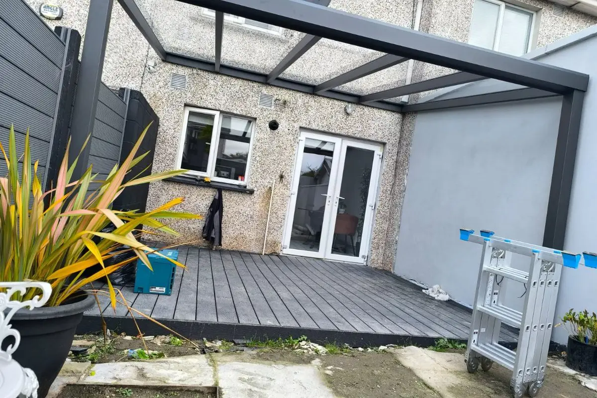 Wall-mounted glass roof pergola over a residential terrace in Dublin