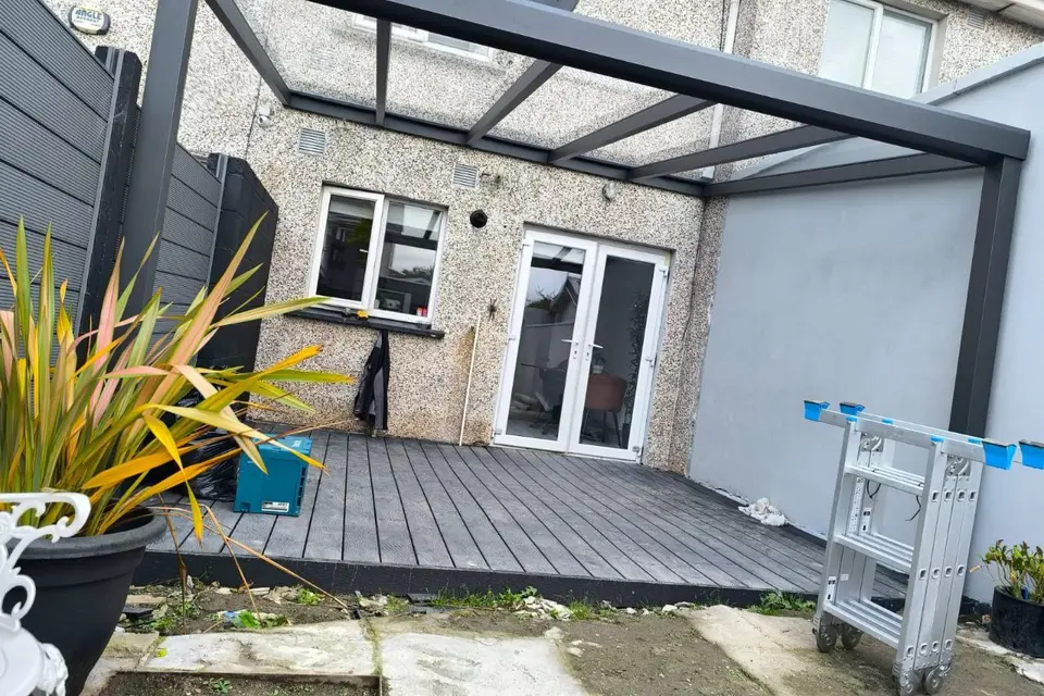 Wall-mounted glass pergola completed at a residential property in Dublin