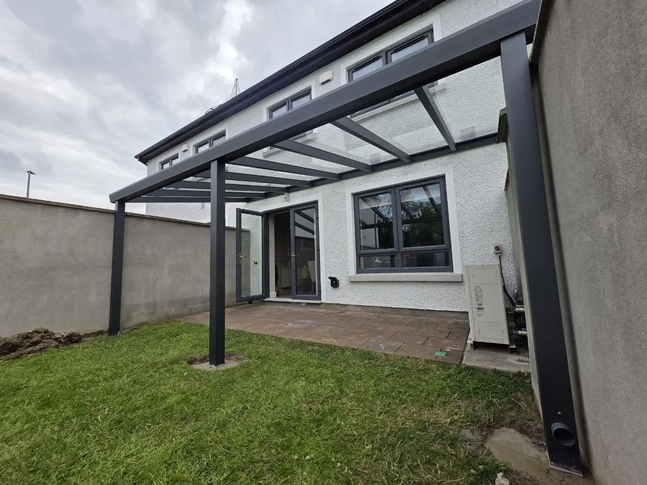 View from beneath the completed safety glass roof pergola in Leixlip