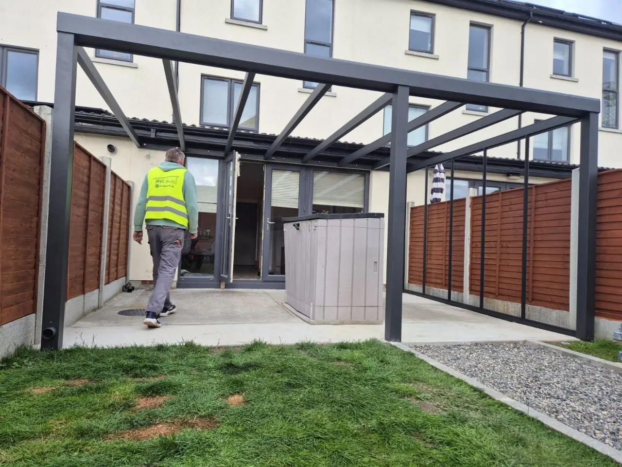 Front view of the wall-mounted aluminium frame during installation in Dublin