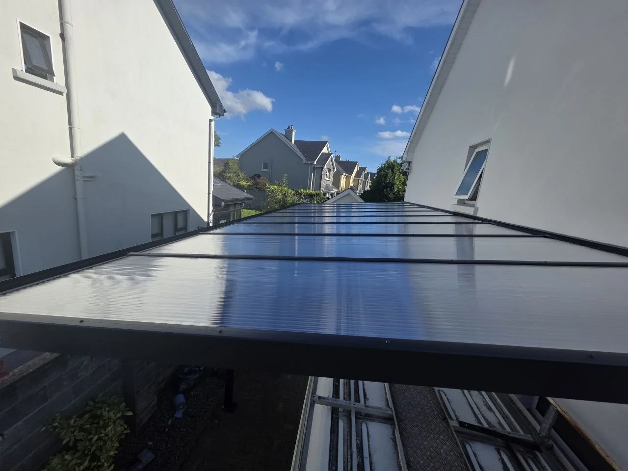 Transparent polycarbonate roof panels on the high-clearance motorhome carport in Ennis