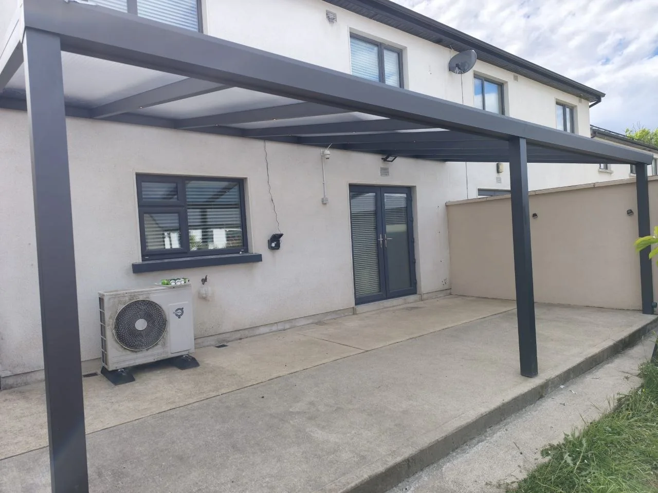 Completed long patio pergola with anthracite aluminium frame in Rathdrum