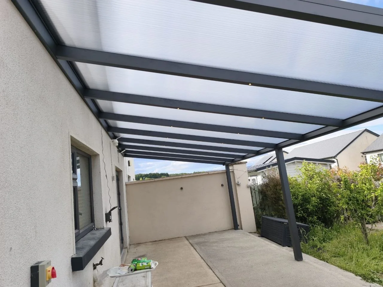 View from beneath the transparent polycarbonate roof over the Rathdrum patio