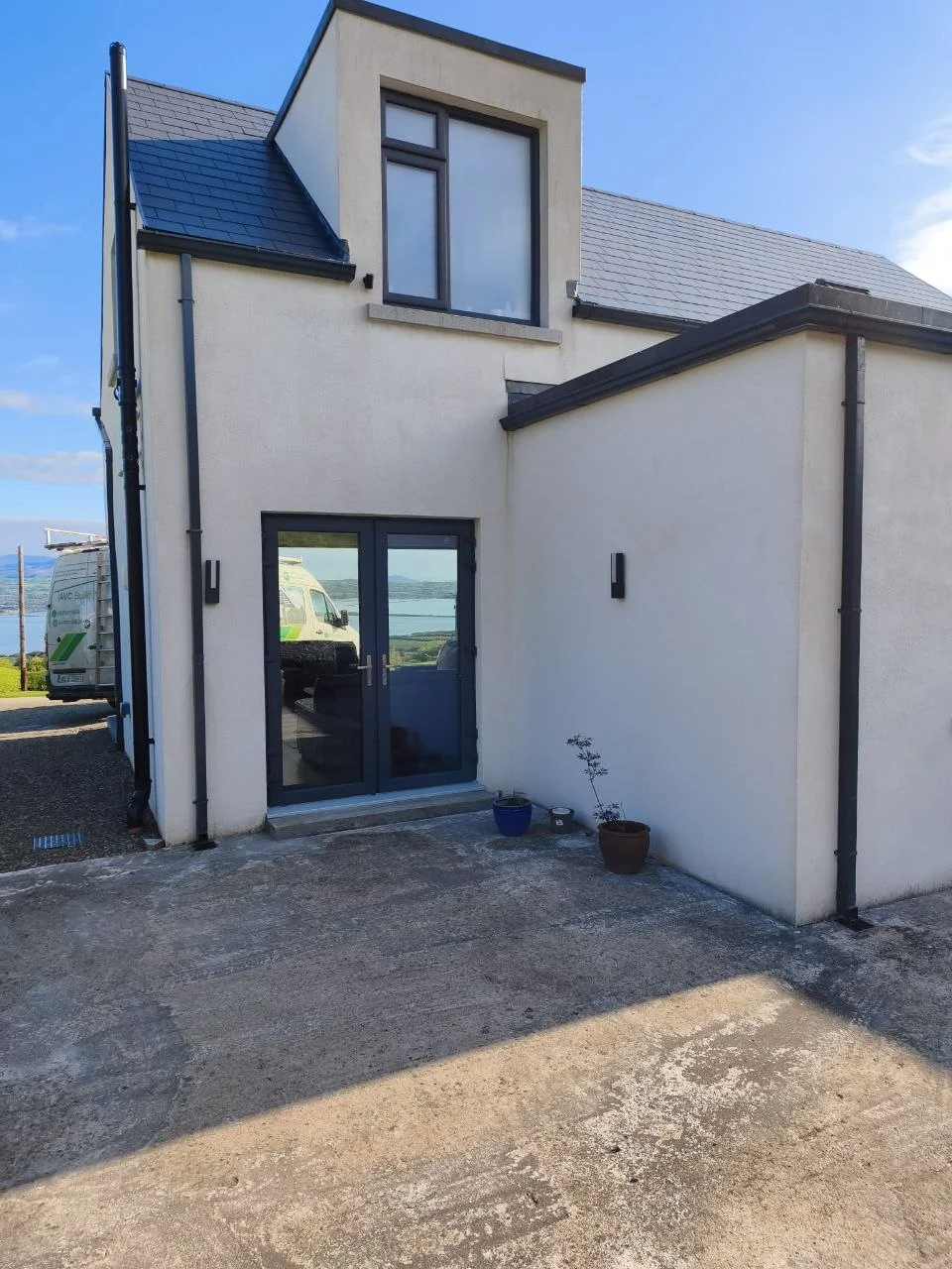 Entrance area beside the house before installation of the aluminium canopy in Leagh