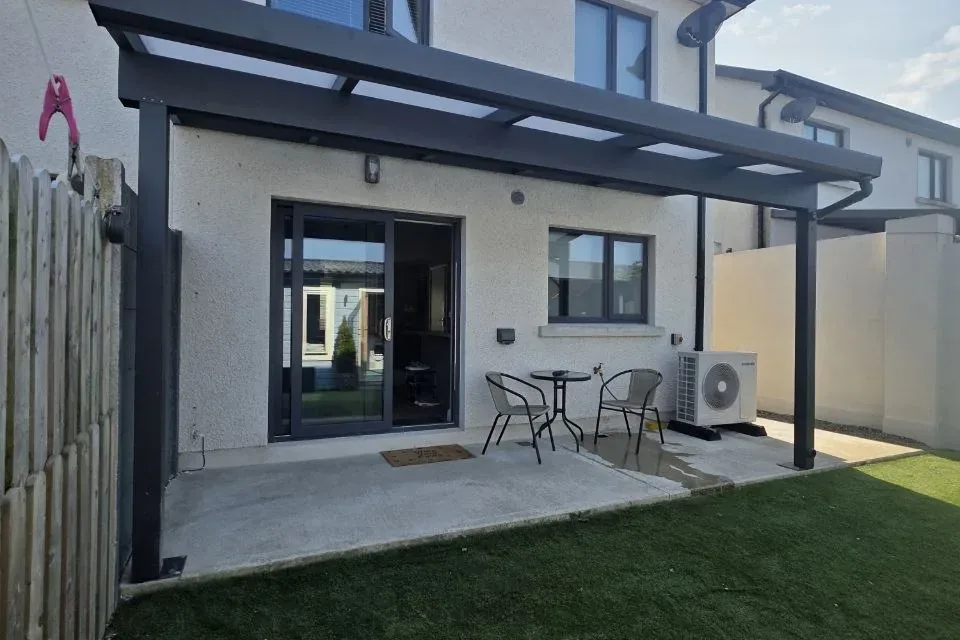 Completed wall-mounted polycarbonate pergola in Rathdrum, Co. Wicklow