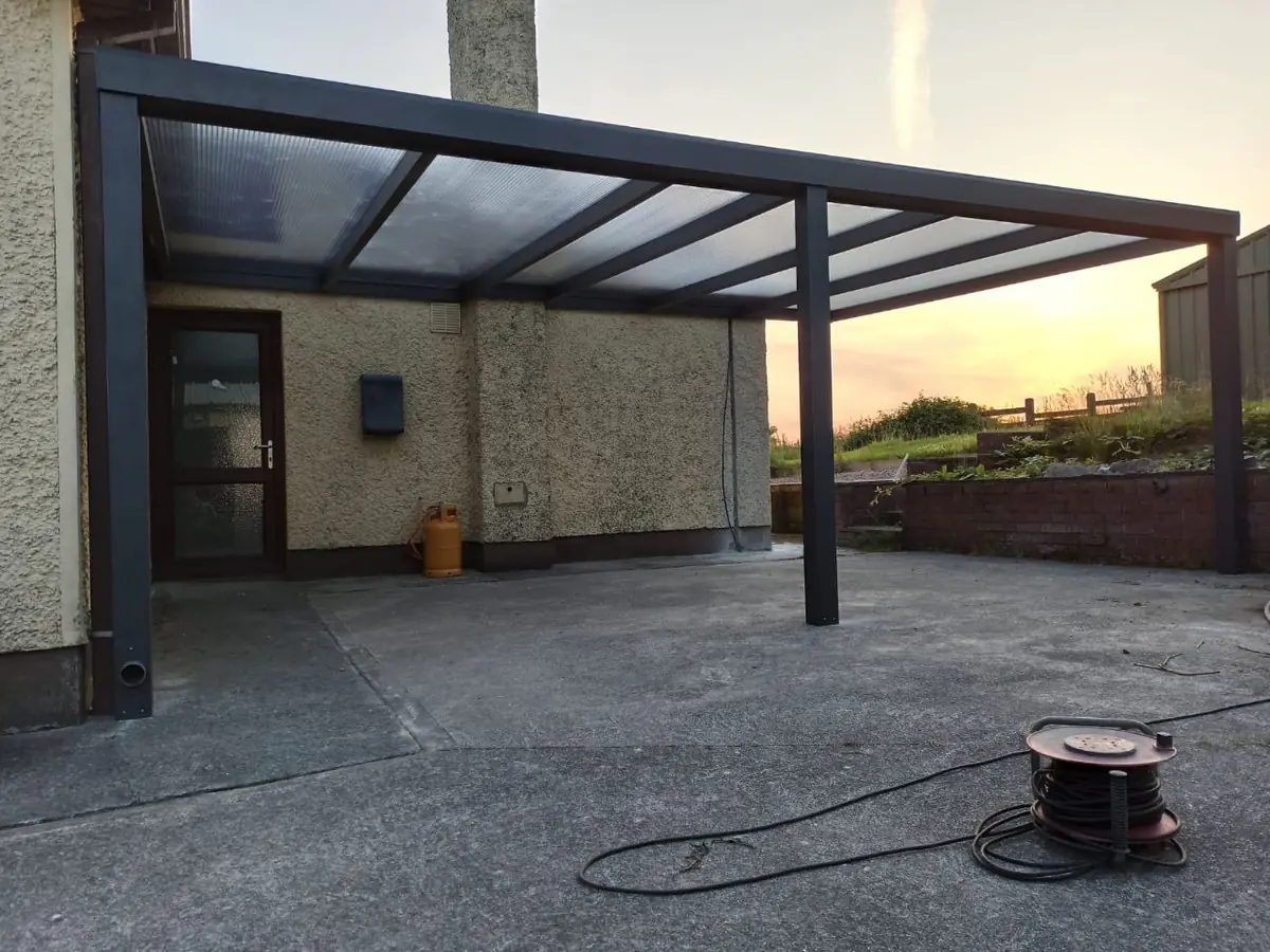 View beneath the translucent polycarbonate roof of the wall-mounted pergola in County Monaghan