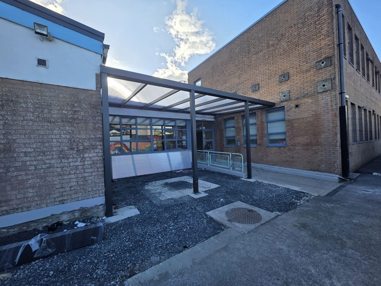 Completed aluminium school entrance canopy with polycarbonate roof in Cashel, County Tipperary